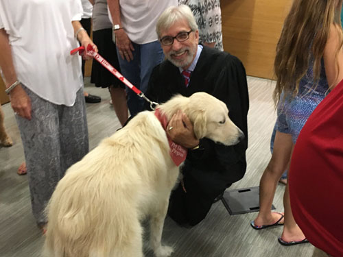 Judge Smith with therapy dog Lance