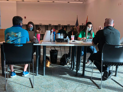 Clerks review court records with veterans